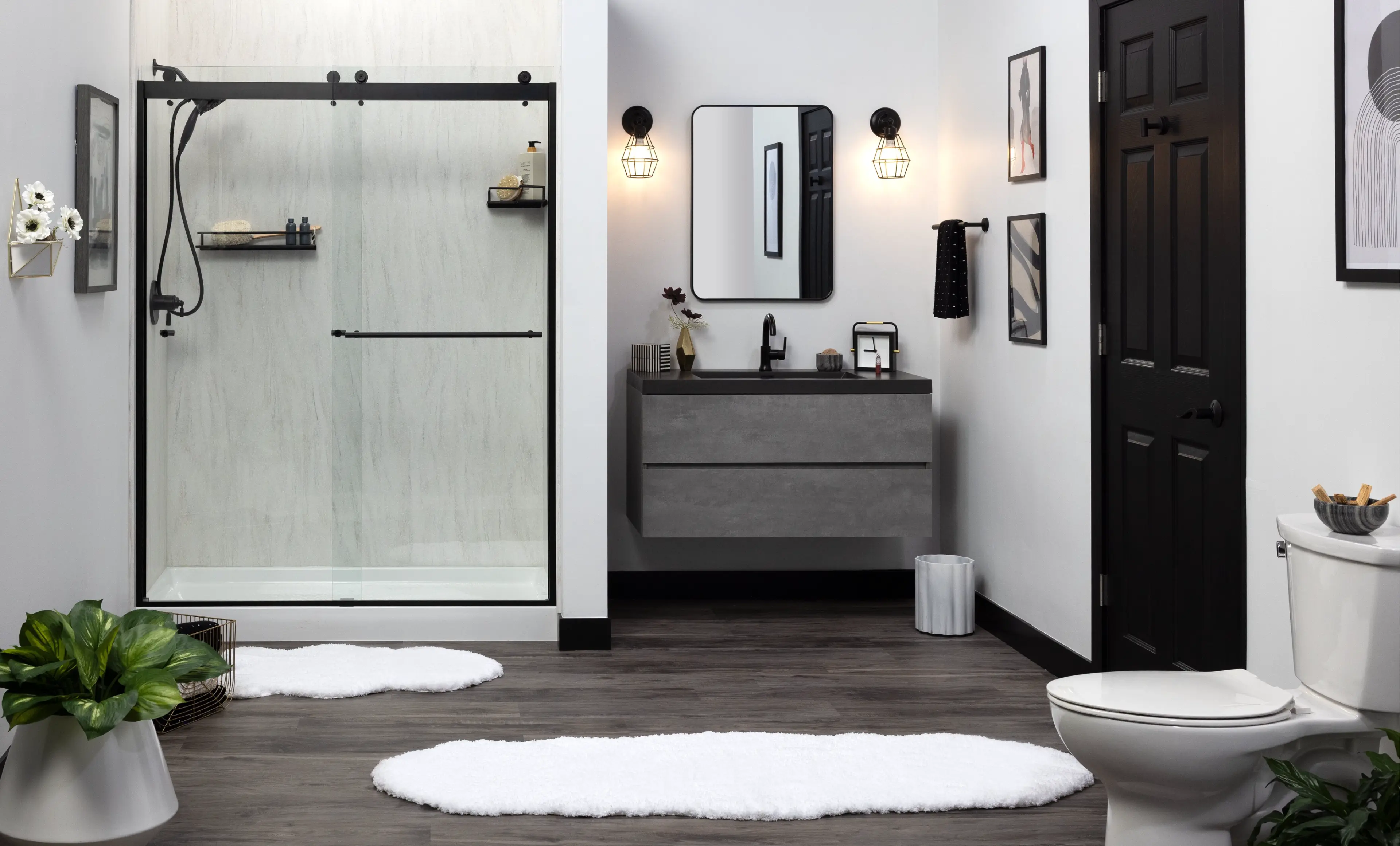 Modern bathroom featuring PuroStone Coastal Mist shower walls with black fixtures
